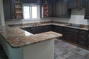 African Canyon Countertops & Tahoe Ash Cabinets